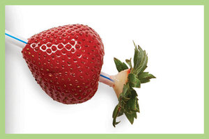 Hull strawberries with a drinking straw.