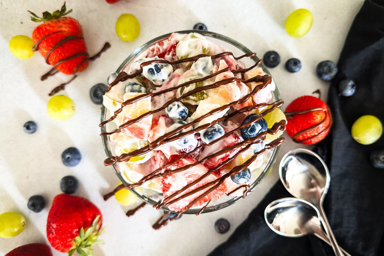 https://d2gtpjxvvd720b.cloudfront.net/system/recipe/image/6410/retina_Hungry-Girl-Healthy-Chocolate-Drizzled-Creamy-Fruit-Salad-Recipe-20240820-1751-12922-5109.jpg